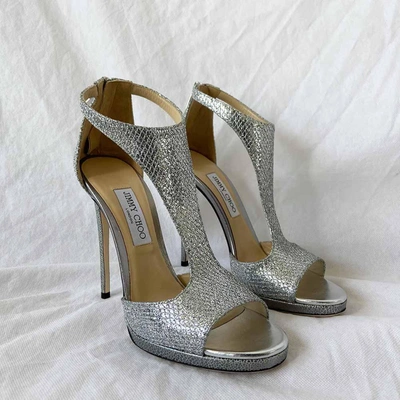 Pre-owned Jimmy Choo Silver Glitter ‘lana' T-strap 100mm Sandals, 41 In Used / 41 / Silver