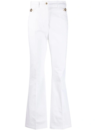 Patou Embellished High-rise Flared Jeans In White