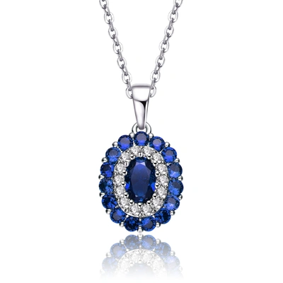 Genevive Sterling Silver Rhodium Plated And Sapphire Cubic Zirconia Pendant In Blue