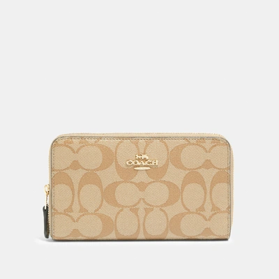 Coach Outlet Medium Id Zip Wallet In Signature Canvas In Beige