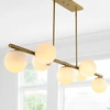 JONATHAN Y Luca Parisian 53" 7-Light Modern Glam Iron Globe Linear LED Pendant