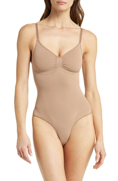 Skims Sculpt Briefs Bodysuit In Sienna