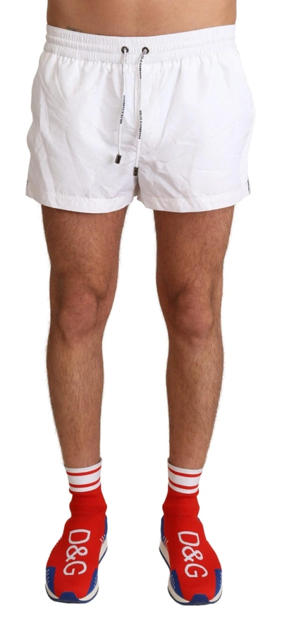 DOLCE & GABBANA DOLCE & GABBANA ELEGANT WHITE KING MOTIVE SWIM MEN'S TRUNKS