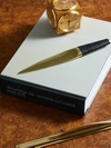 CARL AUBOCK BRASS AND LEATHER LETTER OPENER