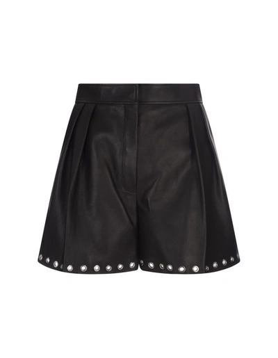 Alexander Mcqueen Leather Shorts With Metal Eyelets In Black