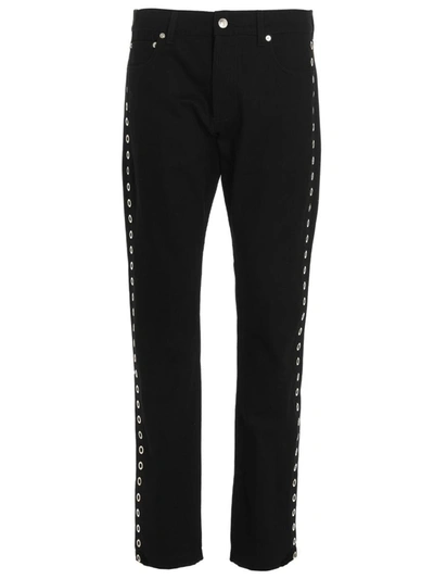 Alexander Mcqueen Metal-eyelet Detail Jeans In Black