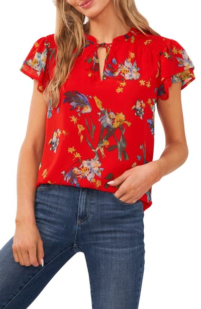 Cece Floral Tie Neck Flutter Sleeve Top In Fiery Red