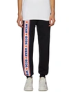 Gcds Side Logo Stripe Track Pants In Black