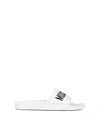 Moschino Embossed Logo Pool Slides In White