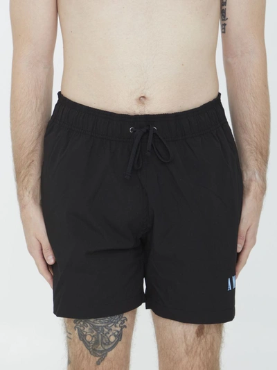 Amiri Logo Printed Swim Shorts In Black
