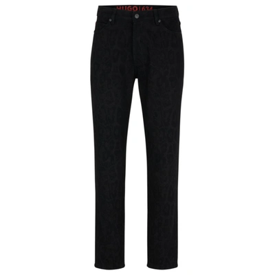 Hugo Tapered-fit Jeans In Jaglion-print Rigid Denim In Black