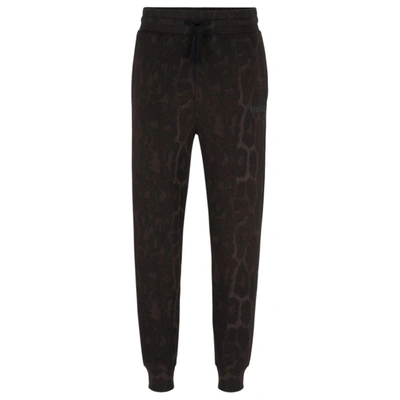 Hugo Boss Jaglion-pattern Tracksuit Bottoms In French-terry Cotton In Black