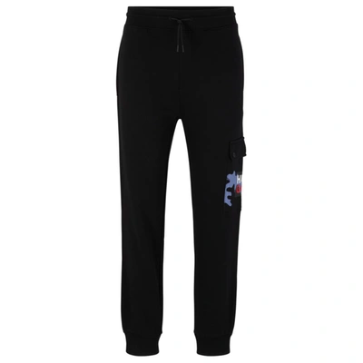 Hugo Men's Cotton-terry Tracksuit Bottoms With Camouflage Artwork In Black