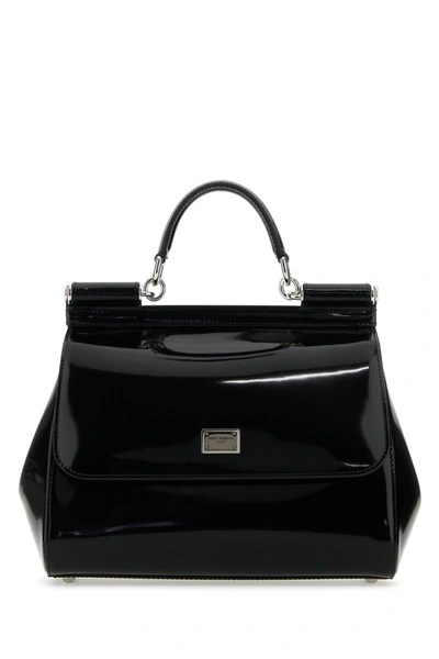 Dolce & Gabbana Handbags. In Black