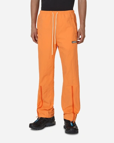 Pleasures Gaze Nylon Track Pants In Orange