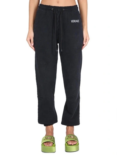 Versace Jogging Trousers With Logo In Nero