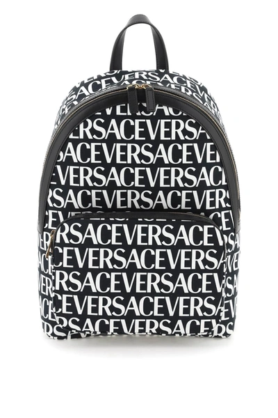 Versace All-over Logo Backpack In Black