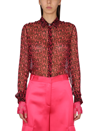 Versace Logo-print Semi-sheer Silk Shirt In Fucsia