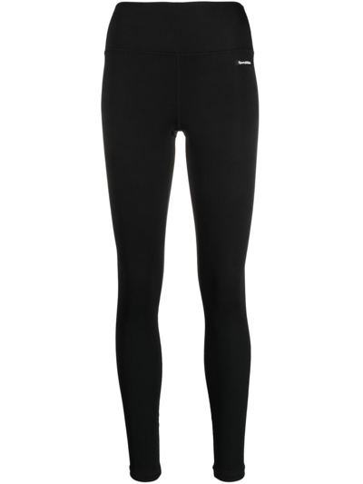 Sporty And Rich Logo-patch Ribbed Leggings In Black