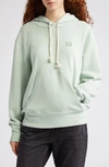 Acne Studios Fairah Face Patch Oversize Cotton Hoodie In Soft Green