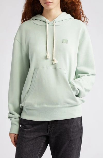 Acne Studios Fairah Face Patch Oversize Cotton Hoodie In Soft Green