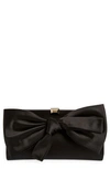 Stuart Weitzman The Vip Loveknot Clutch In Black