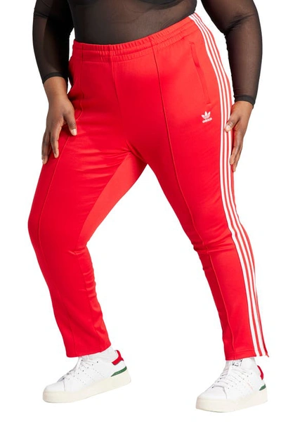 Adidas Originals Originals Plus Size Adicolor Sst Tracksuit Bottoms In Better Scarlet
