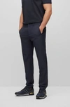 Hugo Boss Slim-fit Chinos In Easy-iron Four-way Stretch Fabric In Dark Blue