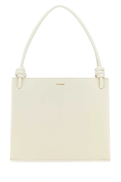 Jil Sander Handbags. In White