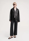 Totême Zipped Wide-sleeve Leather Jacket In Black
