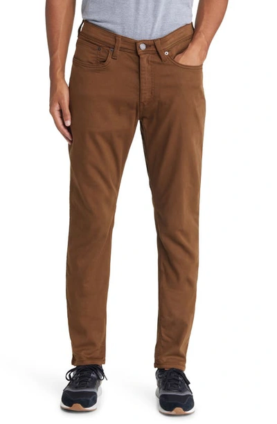 Duer No Sweat Relaxed Tapered Performance Pants In Golden