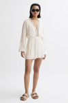 REISS RACHELLE - CREAM LONG SLEEVE LATTICE PLAYSUIT, US 6