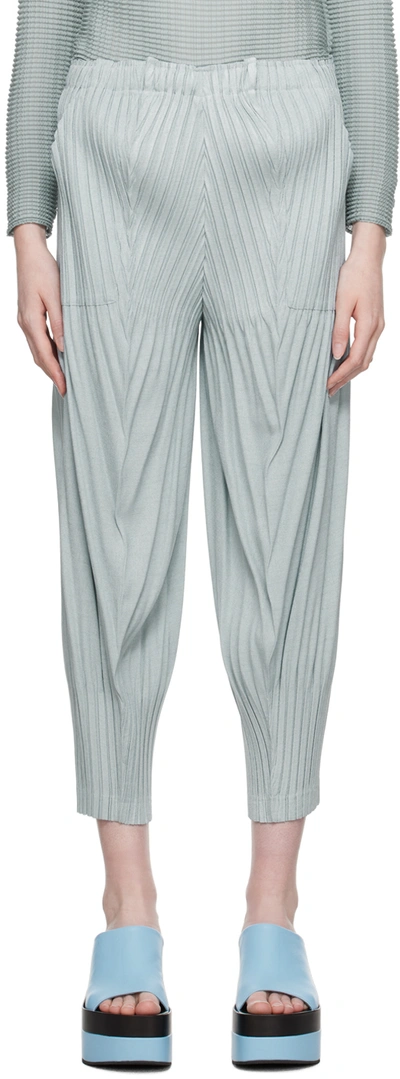 Issey Miyake Tapered Technical-pleated Trousers In 71 Lt Blue