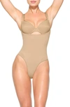 Skims Seamless Sculpt Open Bust Thong Bodysuit In Clay