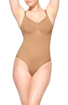 Skims Sculpt Briefs Bodysuit In Ochre