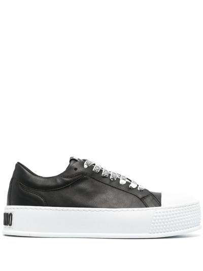 Moschino Embossed-logo Low-top Sneakers In Black