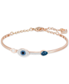 Swarovski Rose Gold-tone Clear And Blue Crystal Evil Eye Adjustable Bangle Bracelet In Gold