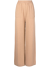 Msgm Embroidered-logo Knit Trousers In Brown