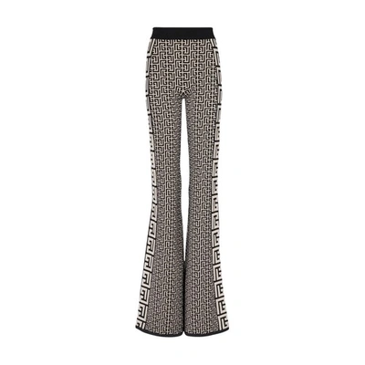 Balmain Flare Pants In Fine Monogrammed Mesh In Black