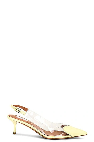 Alaïa Le Coeur 55 Yellow Patent Slingback Pumps In Jaune Pale