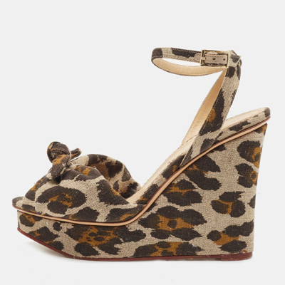 Pre-owned Charlotte Olympia Beige/brown Leopard Canvas Bow Platform Ankle Strap Wedge Sandals Size 38.5