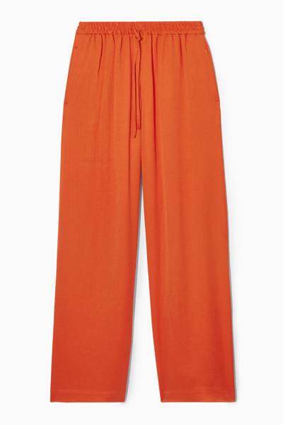 Cos Textured Wide-leg Drawstring Trousers In Orange