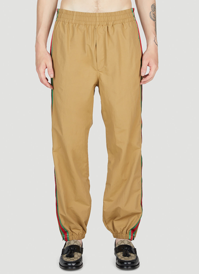 Gucci Web-stripe Logo-patch Track Pants In Camel