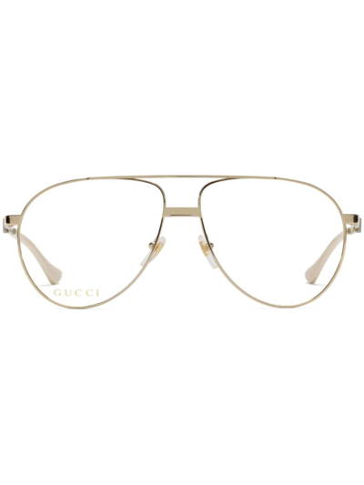 Gucci Navigator Logo-print Glasses In Gold