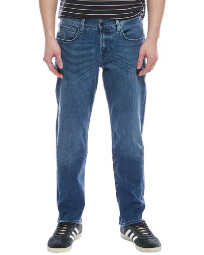 7 FOR ALL MANKIND COMFORT LUXE MID BLUE SLIM TAPERED JEAN