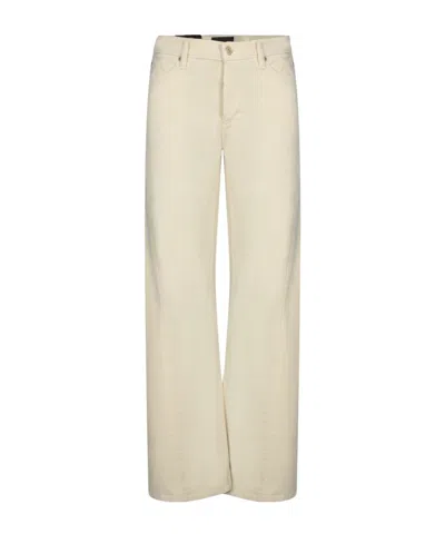 7 FOR ALL MANKIND EMBOSSED LOGO WRANGLER JEANS