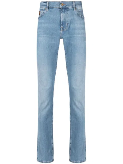 7 For All Mankind Logo-patch Whiskering-effect Slim-cut Jeans In Blue