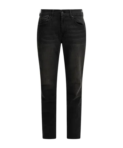 7 For All Mankind Slimmy Tapered Jeans In Dark Washed Denim In Black
