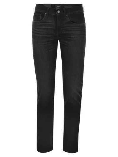 7 FOR ALL MANKIND SLIMMY TAPERED - SKINNY MEDIUM-WAISTED JEANS