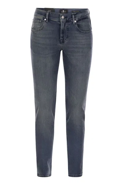 7 FOR ALL MANKIND 7 FOR ALL MANKIND SLIMMY TAPERED GLOBE - SKINNY MEDIUM-WAISTED JEANS